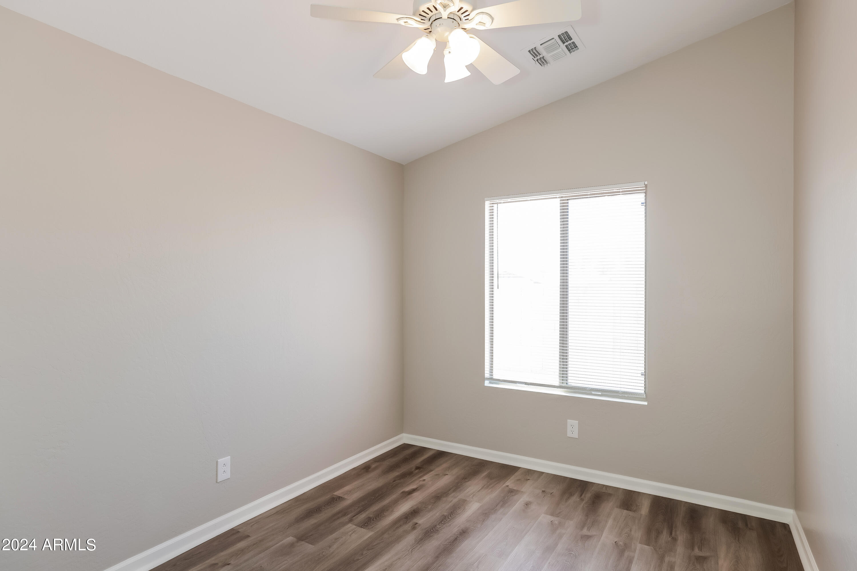 1815 East Hamel Way Phoenix, AZ 85022 - Photo 12 of 16 an empty room with a window