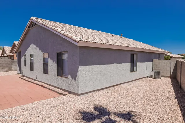 a front view of a house with parking