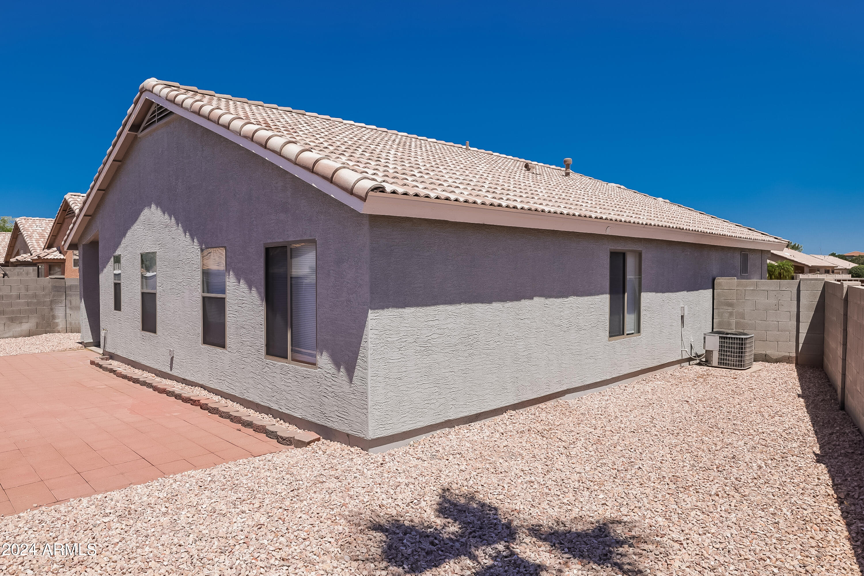 1815 East Hamel Way Phoenix, AZ 85022 - Photo 15 of 16 a front view of a house with parking
