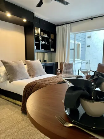 a bathroom with a bathtub and a sink