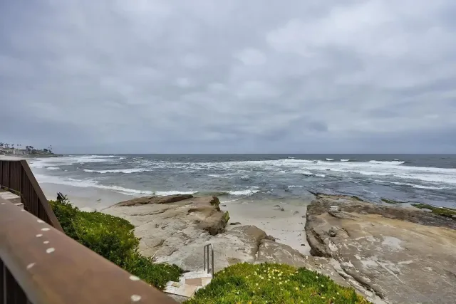 a view of a building with sitting area