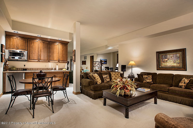 572 Diamond A Ranch Road Carbondale, CO 81623 - Photo 20 of 27 a living room with furniture and kitchen view