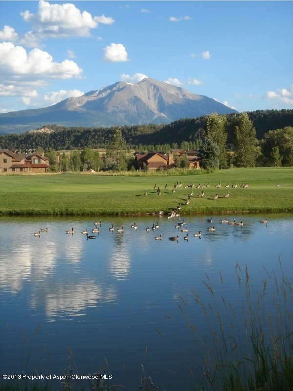 572 Diamond A Ranch Road Carbondale, CO 81623 - Photo 25 of 27 a view of a lake with a mountain in the background
