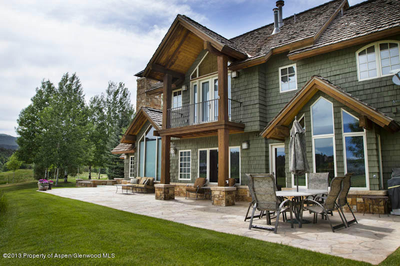 572 Diamond A Ranch Road Carbondale, CO 81623 - Photo 3 of 27 a view of a house with patio and a yard