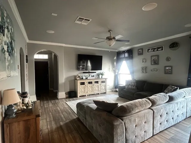 a bedroom with a bed and lamp