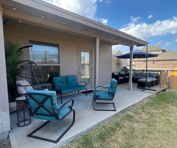 a kitchen with kitchen island a sink stainless steel appliances and cabinets