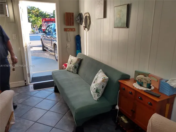 a living room with furniture and a couch
