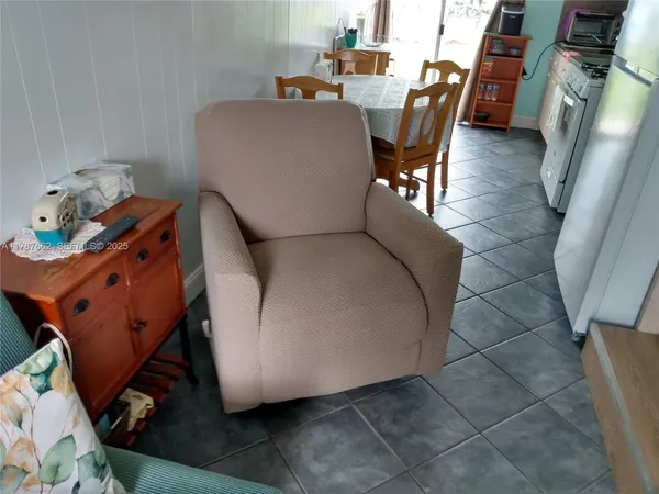 a workspace with furniture and wooden floor