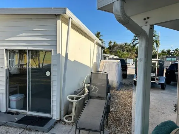 a backyard of a house with seating space