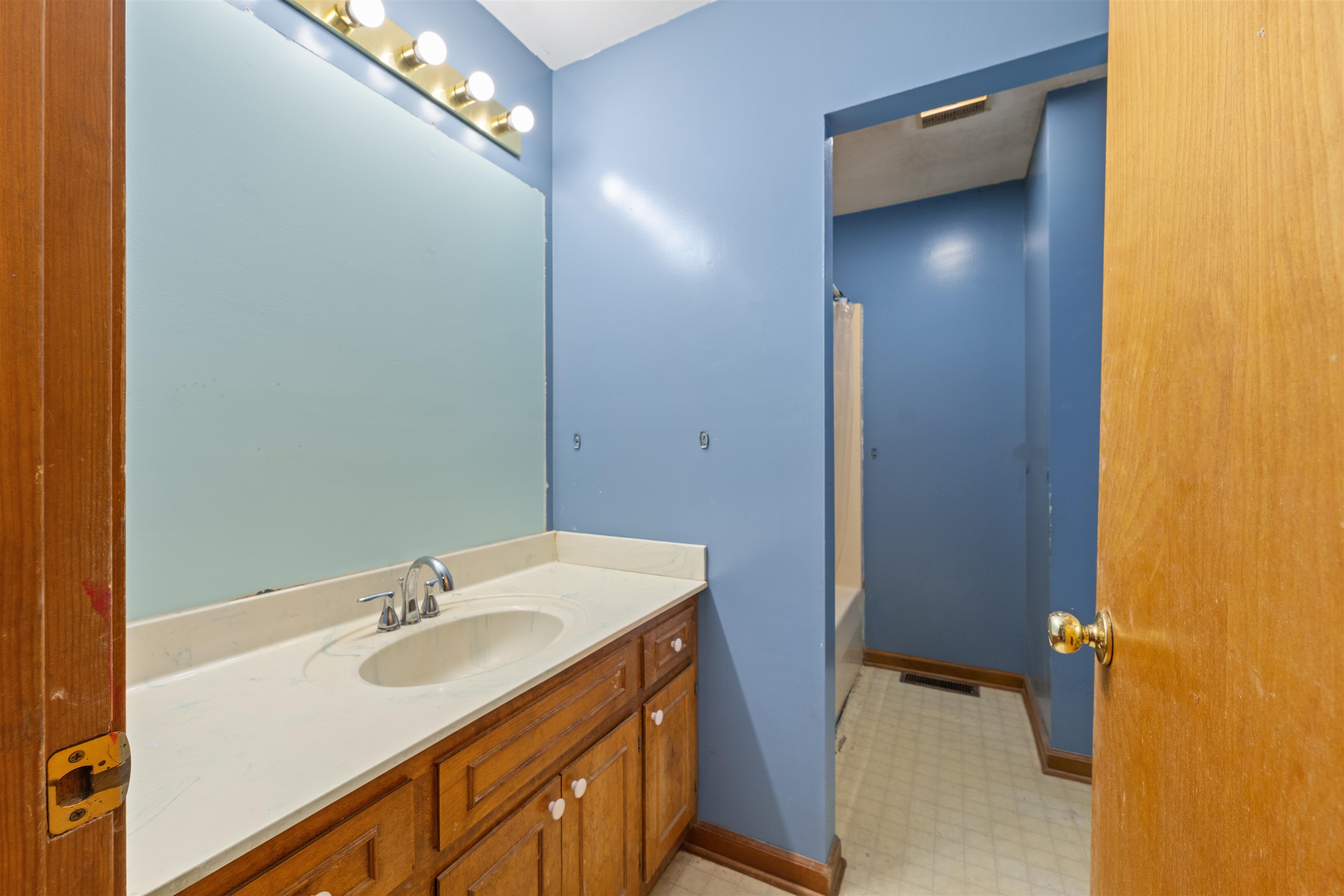 465 Metro Road Eads, TN 38028 - Photo 13 of 27 a bathroom with a sink and a mirror