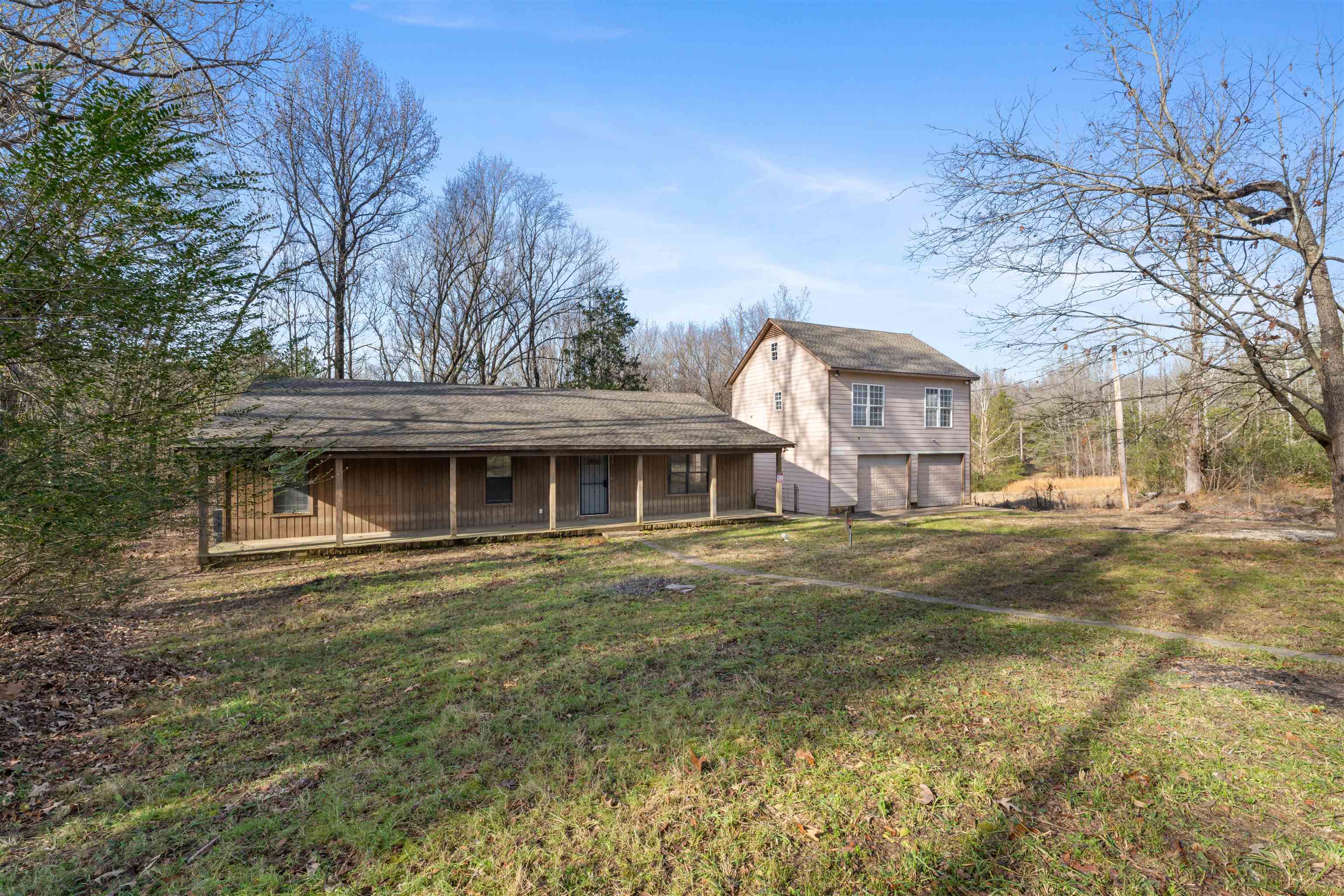 465 Metro Road Eads, TN 38028 - Photo 2 of 27 a front view of a house with a garden