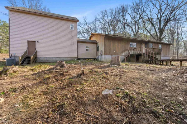 a backyard of a house with lots of green space