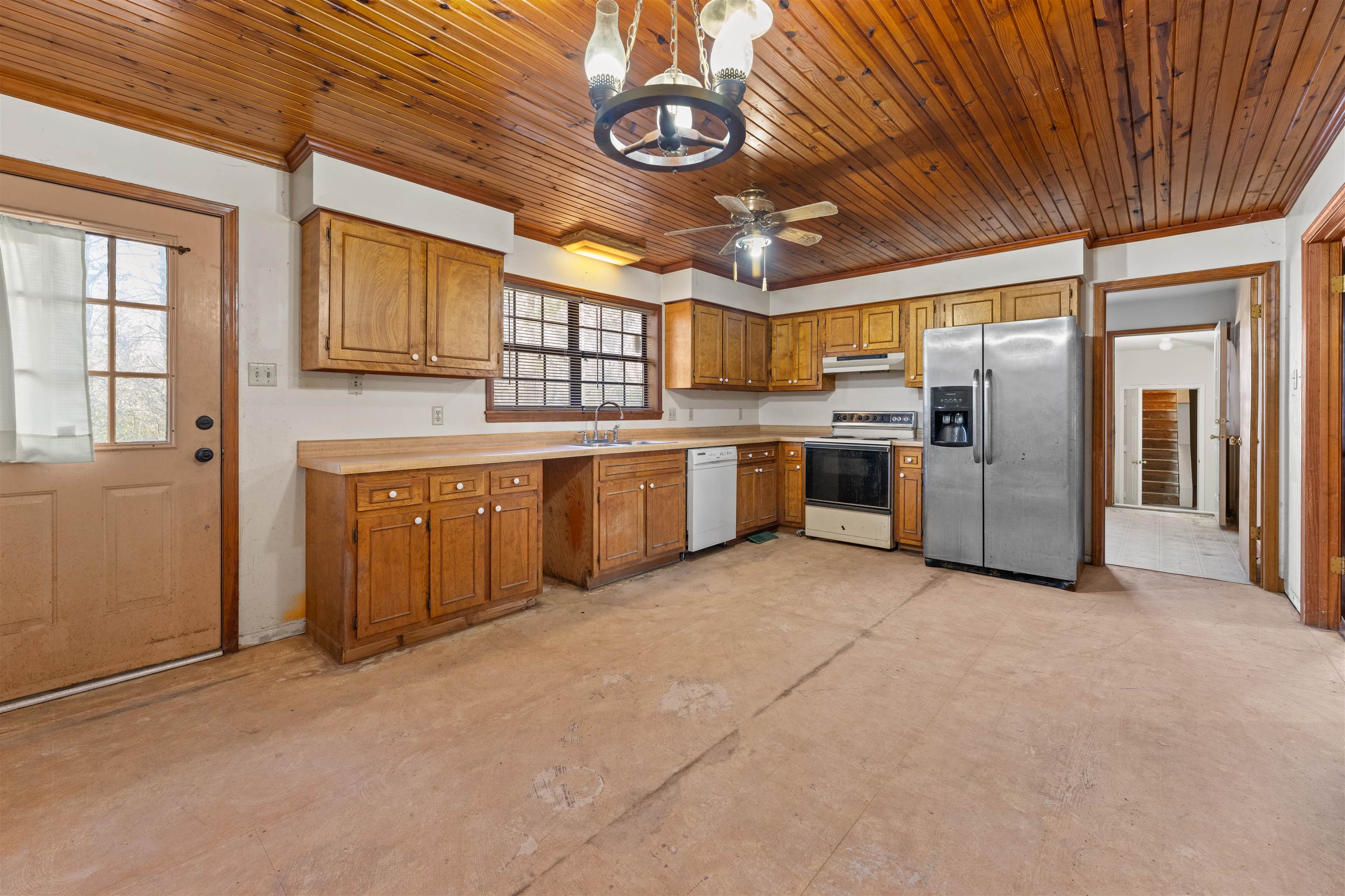 465 Metro Road Eads, TN 38028 - Photo 8 of 27 a large kitchen with stainless steel appliances granite countertop a stove refrigerator and cabinets
