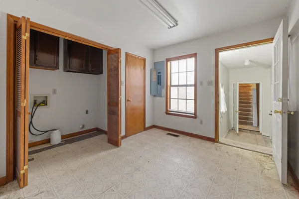 a view of a kitchen with a sink and a window