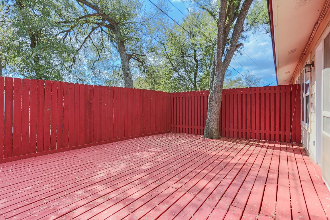 1003 Beaver Trail, Unit A Austin, TX 78746 - Photo 14 of 15 a view of wooden deck