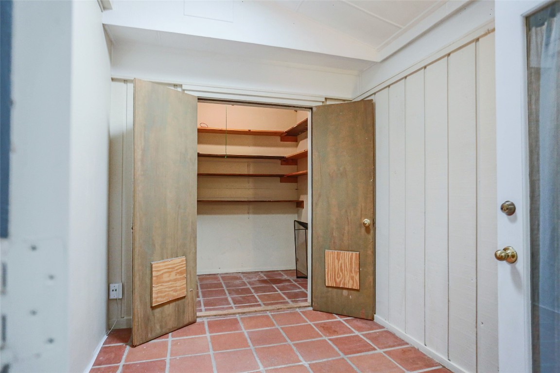 1003 Beaver Trail, Unit A Austin, TX 78746 - Photo 5 of 15 a view of a walk in closet
