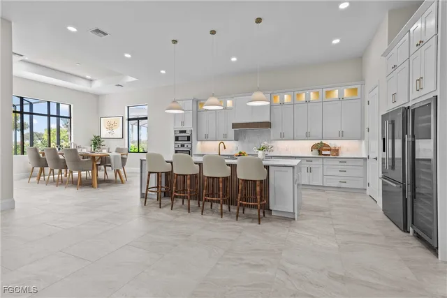 a kitchen with stainless steel appliances lots of counter top space