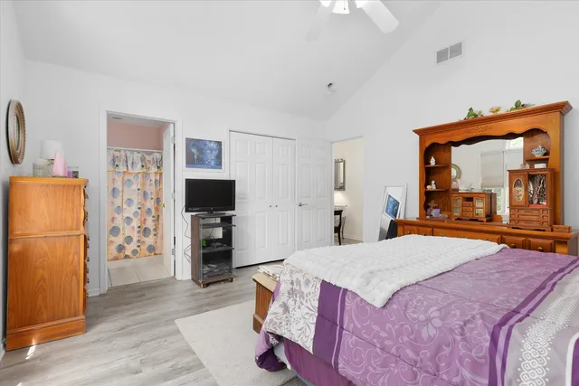 a bathroom with a shower curtain and a sink