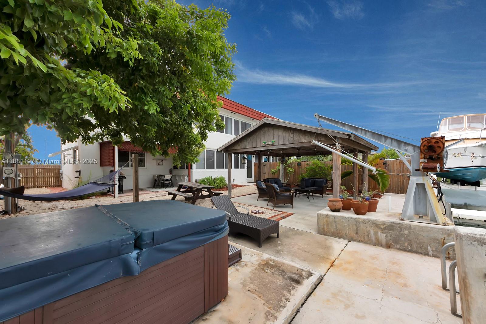 308 Sombrero Beach Road Marathon, FL 33050 - Photo 23 of 43 a outdoor space with patio lots of furniture