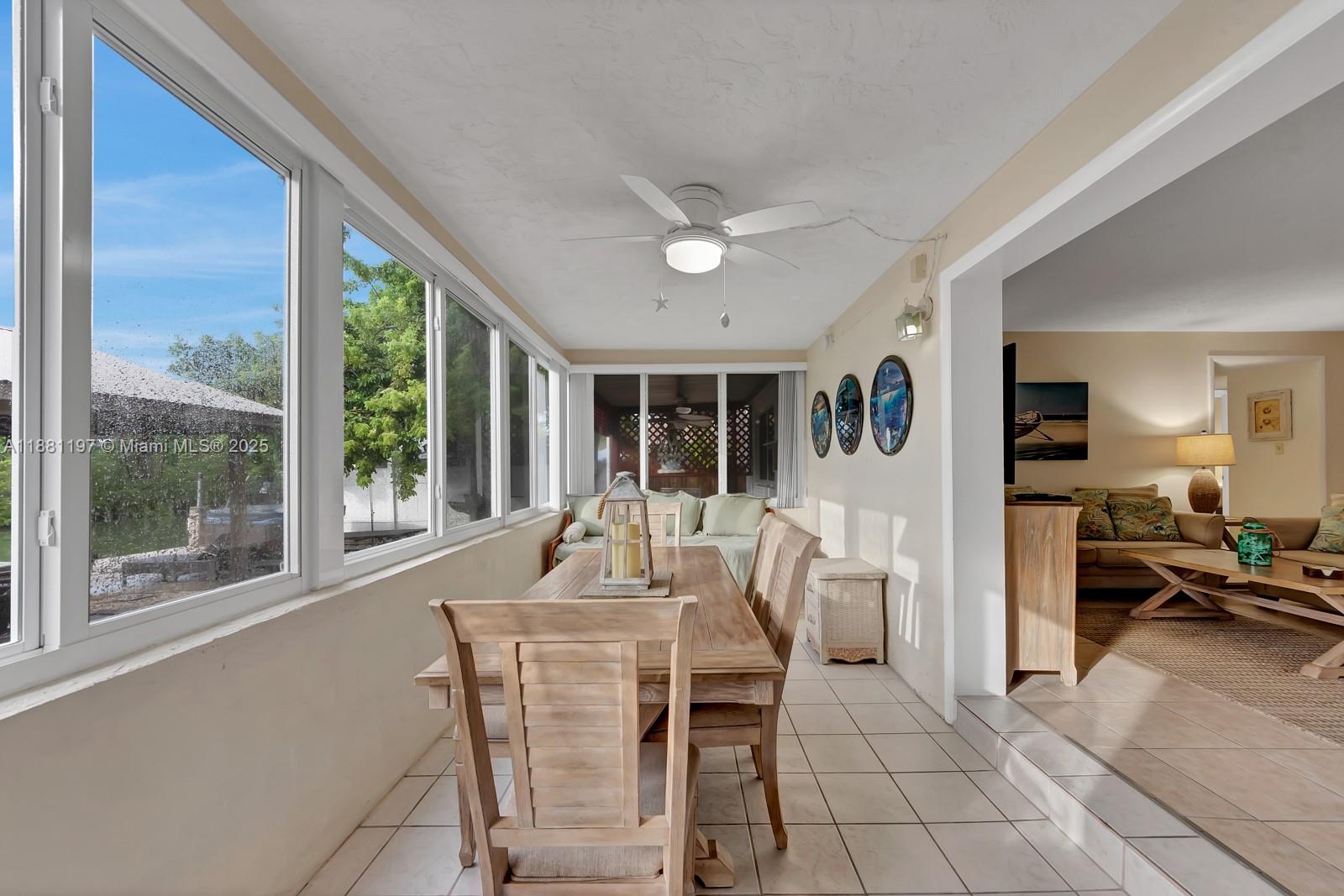 308 Sombrero Beach Road Marathon, FL 33050 - Photo 28 of 43 a dining room with furniture window and outside view