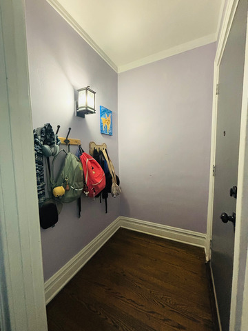 5749 West 64th Place Chicago, IL 60638 - Photo 3 of 12 an empty room with wooden floor and window