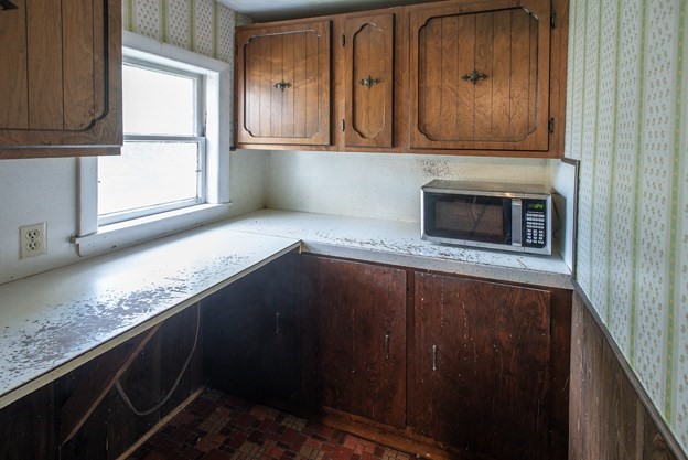 40 Ryan Road Northampton, MA 01062 - Photo 11 of 19 a kitchen with granite countertop cabinets and window