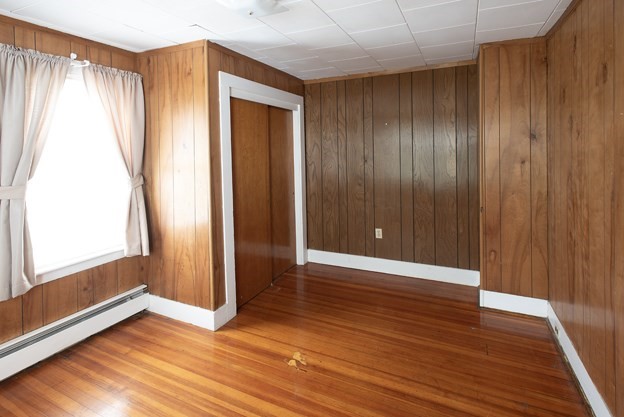 40 Ryan Road Northampton, MA 01062 - Photo 12 of 19 an empty room with wooden floor and windows