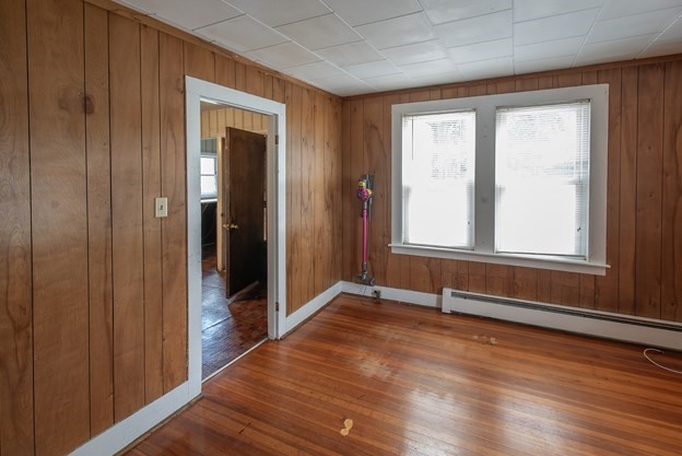 40 Ryan Road Northampton, MA 01062 - Photo 13 of 19 an empty room with wooden floor and windows