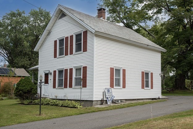 40 Ryan Road Northampton, MA 01062 - Photo 3 of 19 a house that has a tree in front of the house