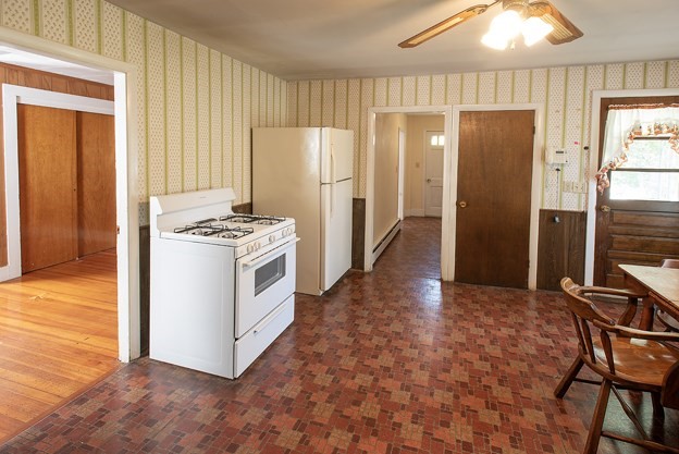 40 Ryan Road Northampton, MA 01062 - Photo 8 of 19 a kitchen with stainless steel appliances a stove a refrigerator and cabinets