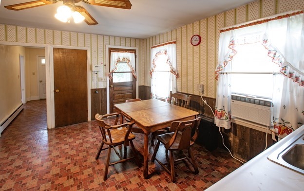 40 Ryan Road Northampton, MA 01062 - Photo 10 of 19 a view of a dining room with furniture window and wooden floor