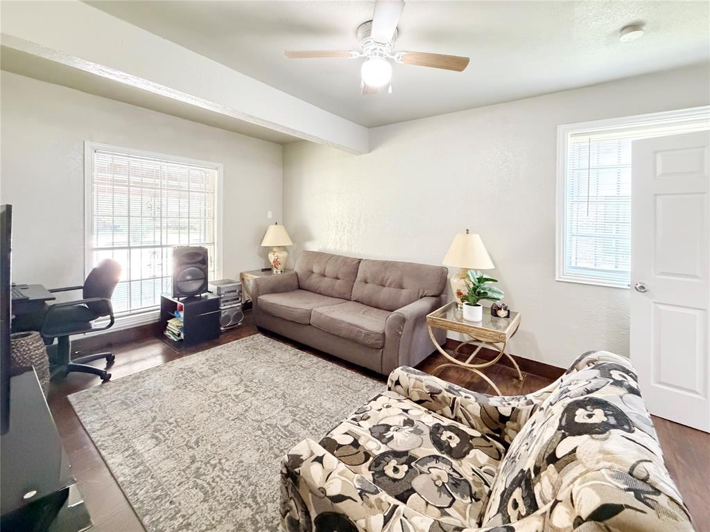 2243 Inca Drive Dallas, TX 75216 - Photo 10 of 24 Secondary living area is tucked away and would make a great game room space.