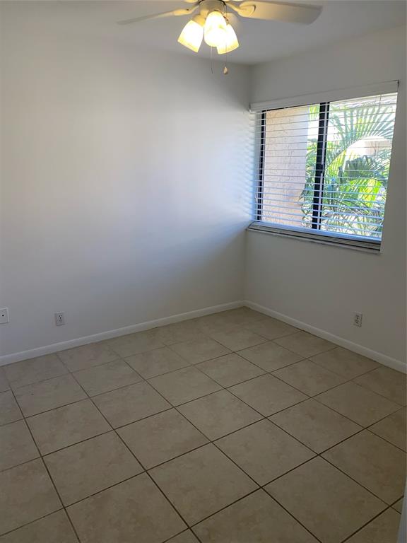 5201 Northeast 14th Terrace, Unit 3 Fort Lauderdale, FL 33334 - Photo 9 of 11 an empty room with a window
