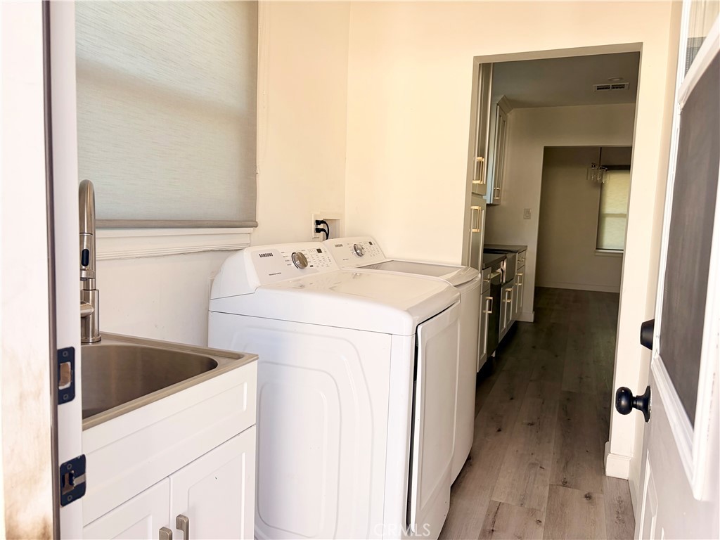 100 Eastern Pasadena, CA 91107 - Photo 16 of 18 a utility room with dryer and washer