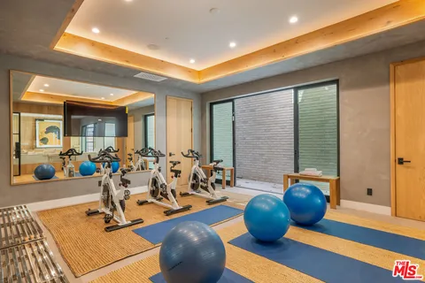 a view of a room with gym equipment