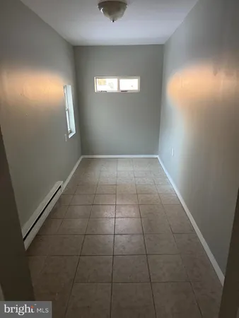 a bathroom with a sink a vanity and a shower