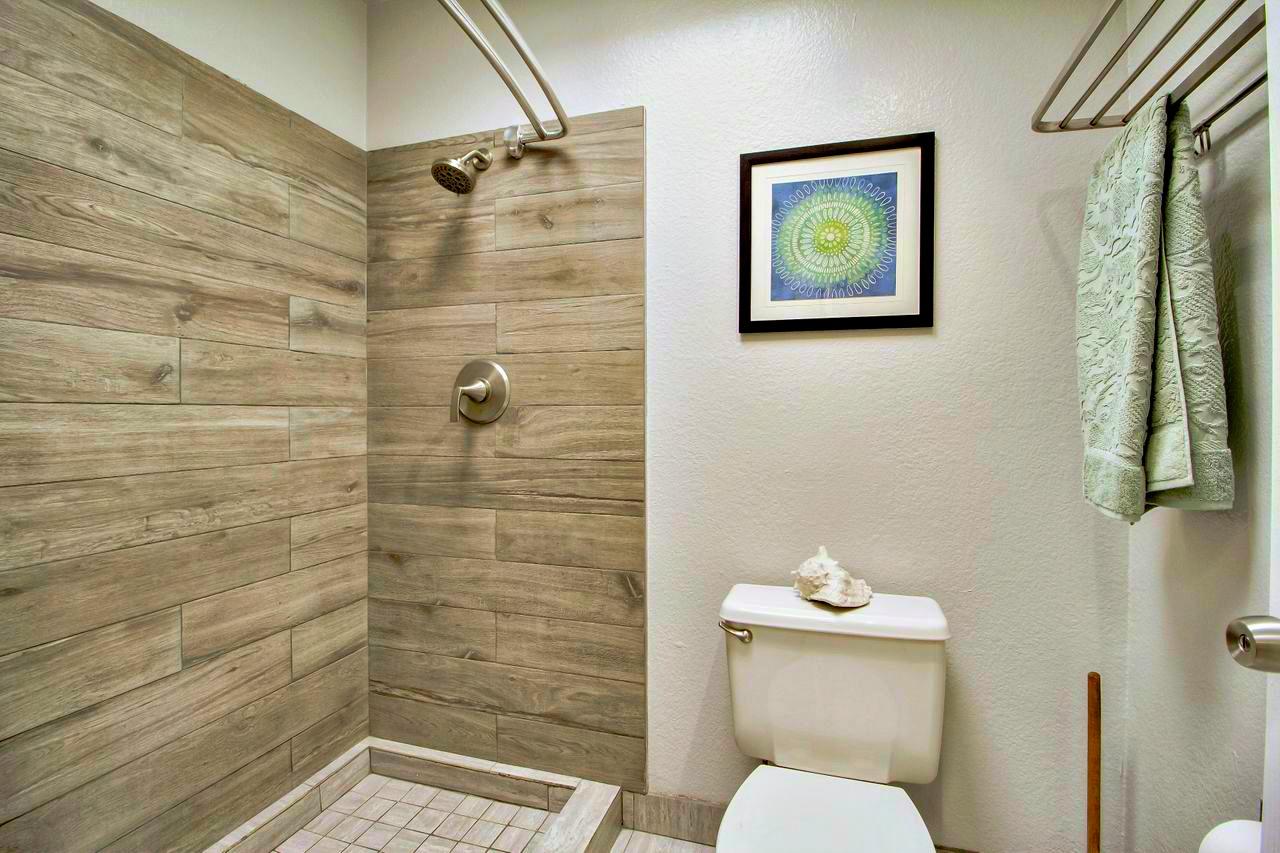 207 Monterey Road, Unit 7 Pacifica, CA 94044 - Photo 17 of 34 a bathroom with a toilet and a shower