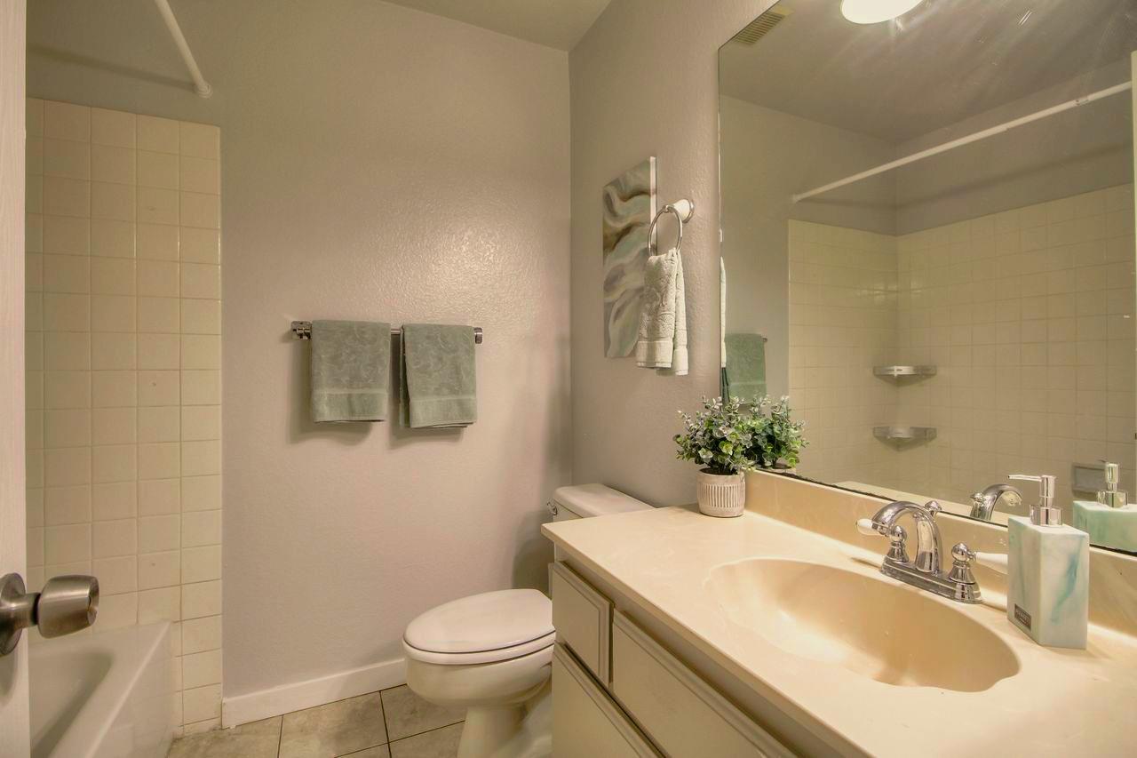 207 Monterey Road, Unit 7 Pacifica, CA 94044 - Photo 19 of 34 a bathroom with a sink toilet and shower