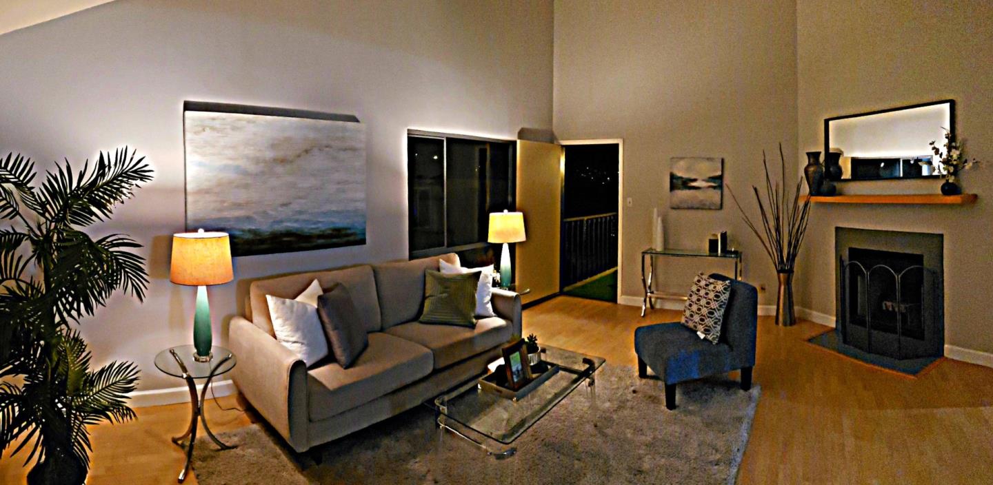 207 Monterey Road, Unit 7 Pacifica, CA 94044 - Photo 31 of 34 a living room with furniture and a fireplace