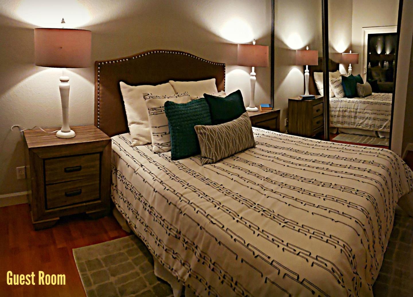 207 Monterey Road, Unit 7 Pacifica, CA 94044 - Photo 34 of 34 a bedroom with a bed a lamp and a large closet