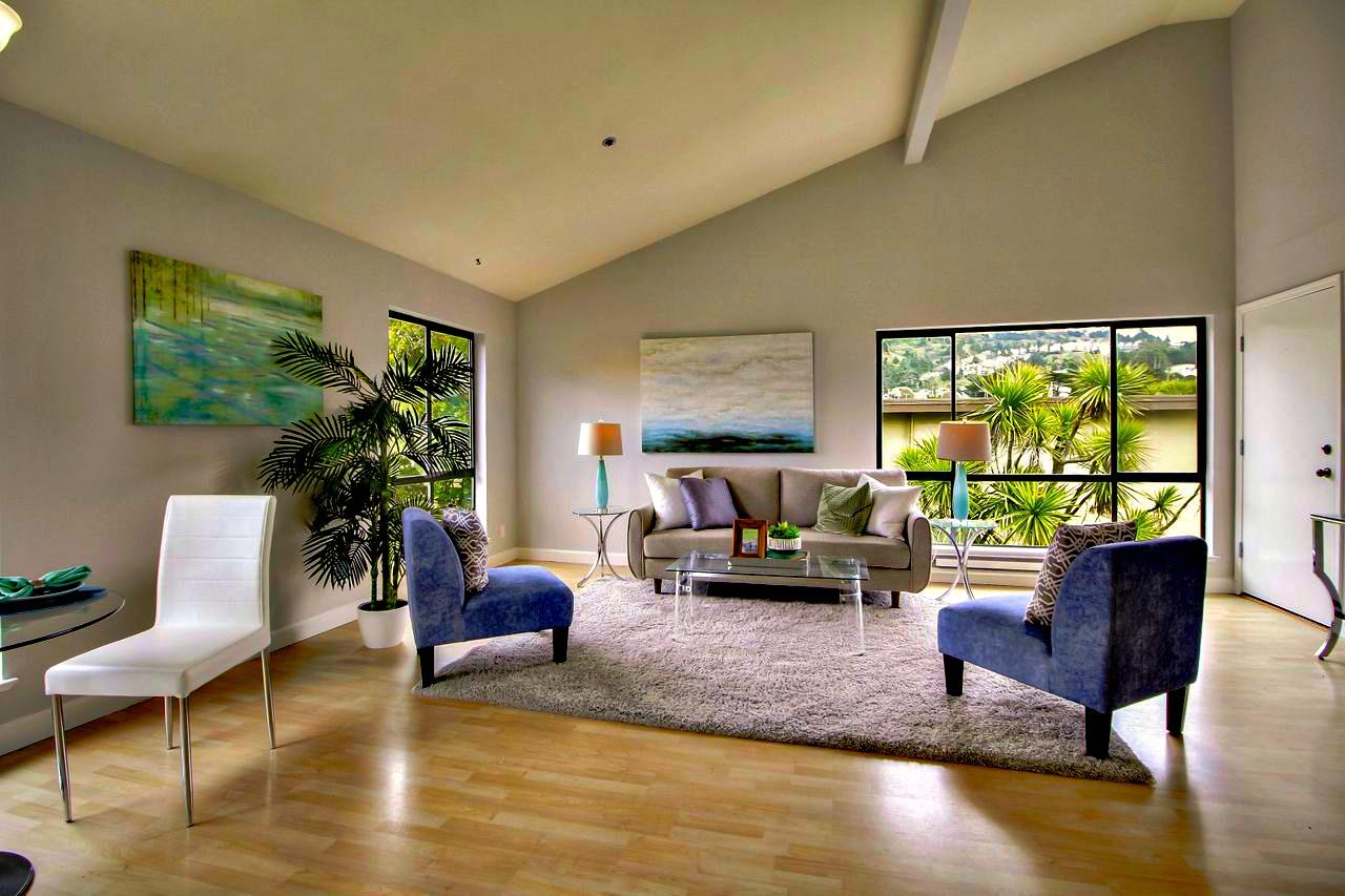 207 Monterey Road, Unit 7 Pacifica, CA 94044 - Photo 8 of 34 a living room with furniture and a large window