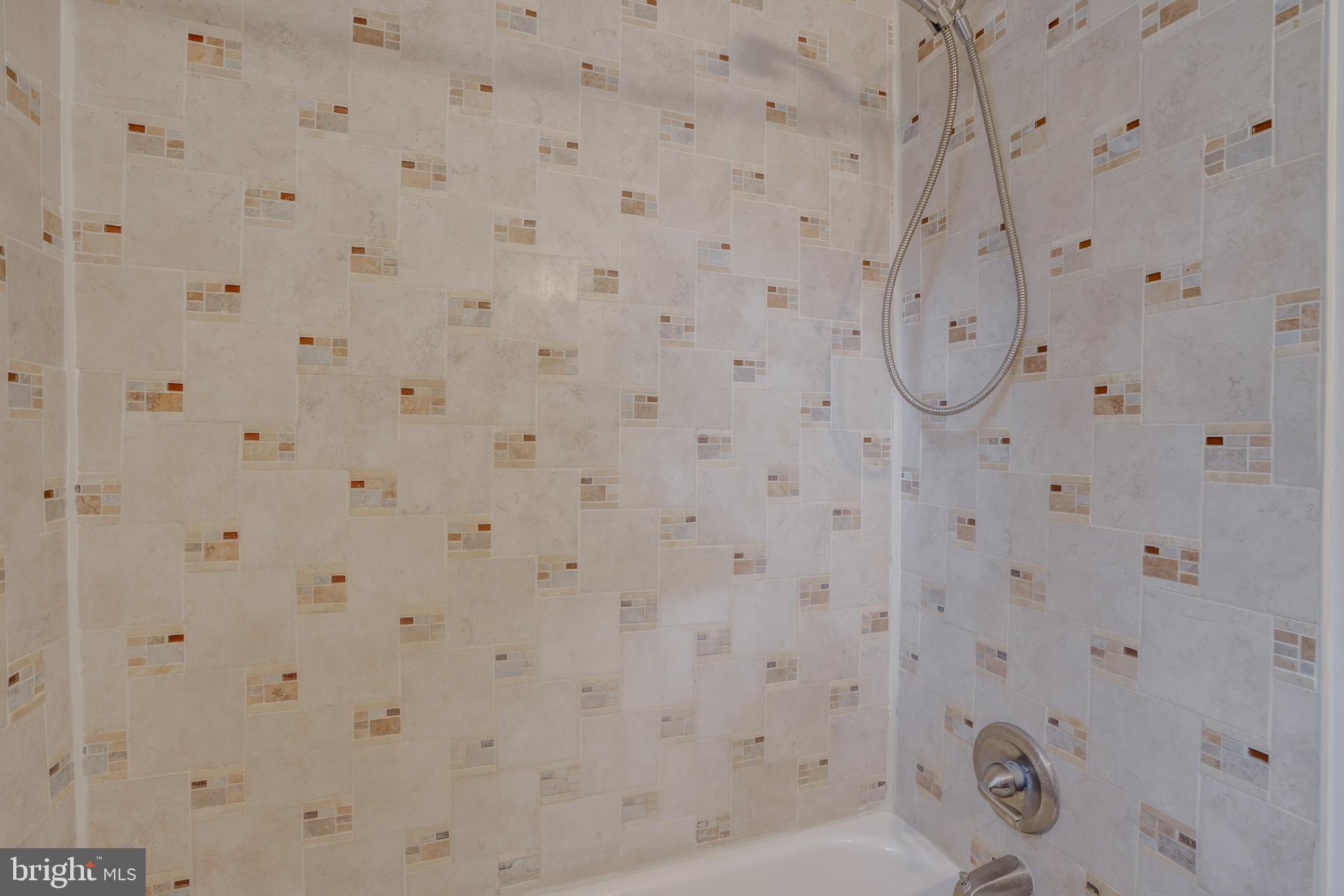 4814 Briarclift Road Baltimore, MD 21229 - Photo 16 of 34 a bathroom with a shower