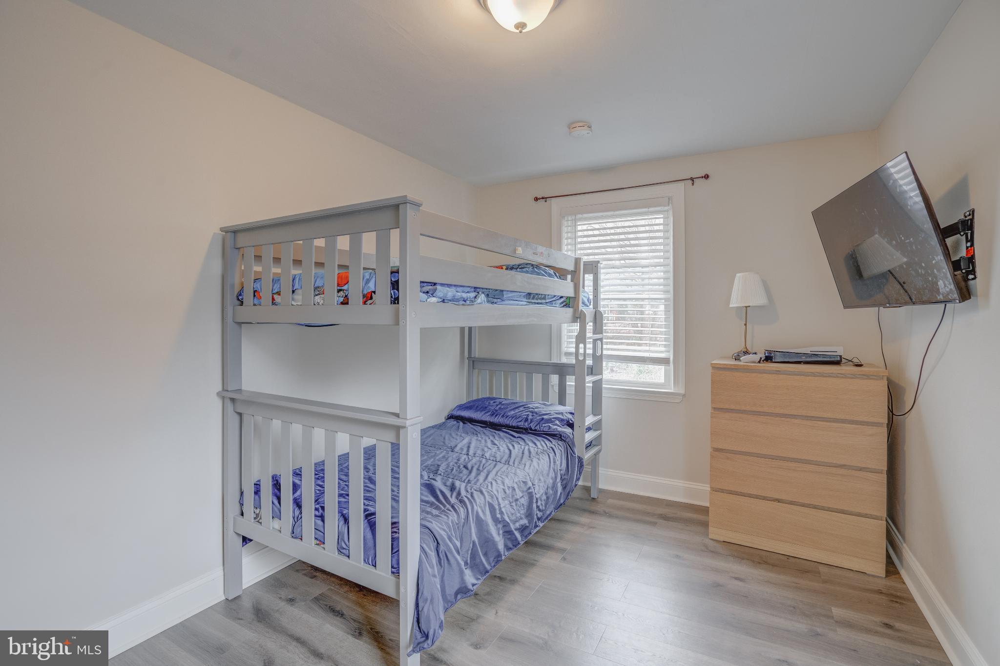 4814 Briarclift Road Baltimore, MD 21229 - Photo 19 of 34 a bedroom with furniture and a window