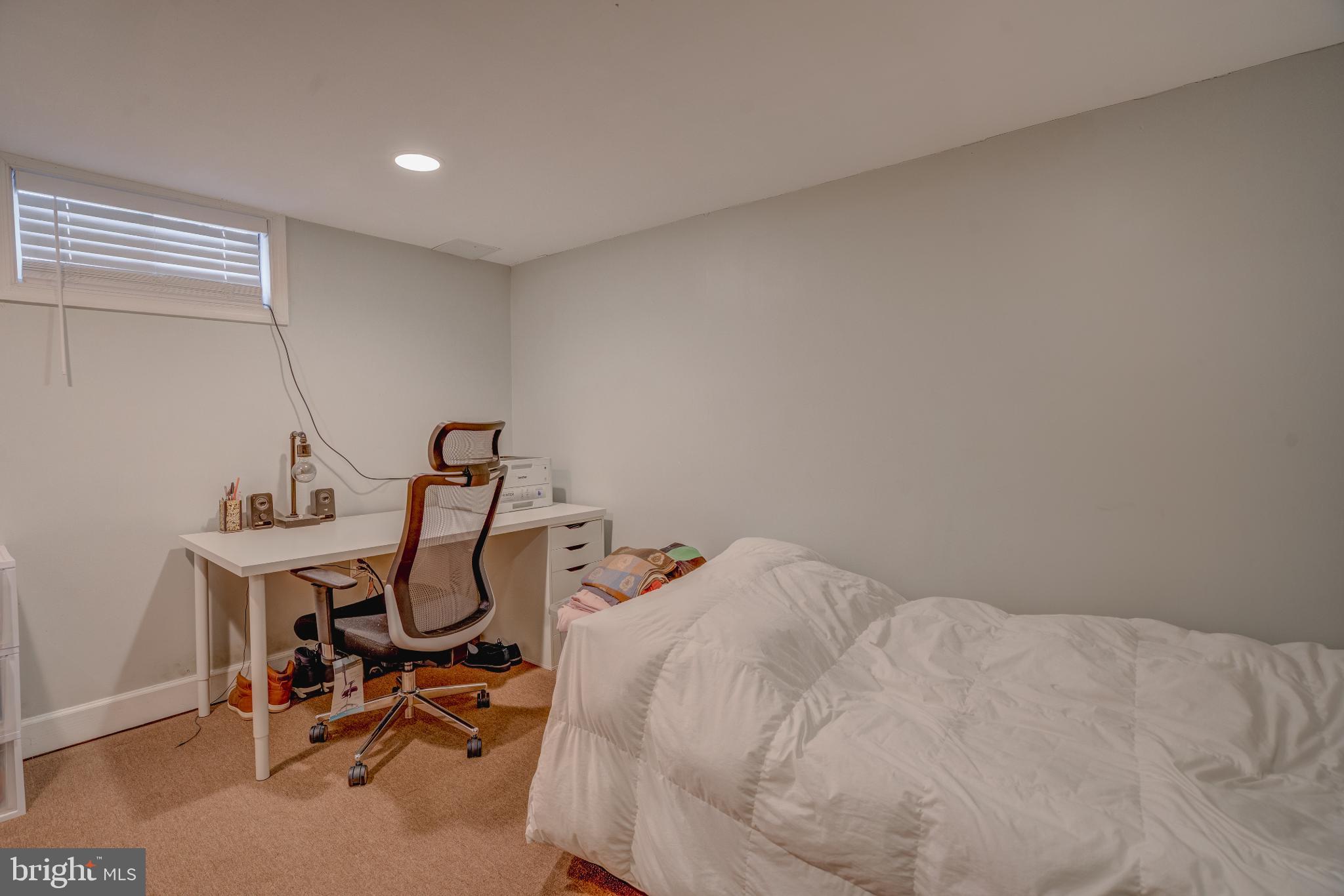 4814 Briarclift Road Baltimore, MD 21229 - Photo 24 of 34 a bedroom with a workspace