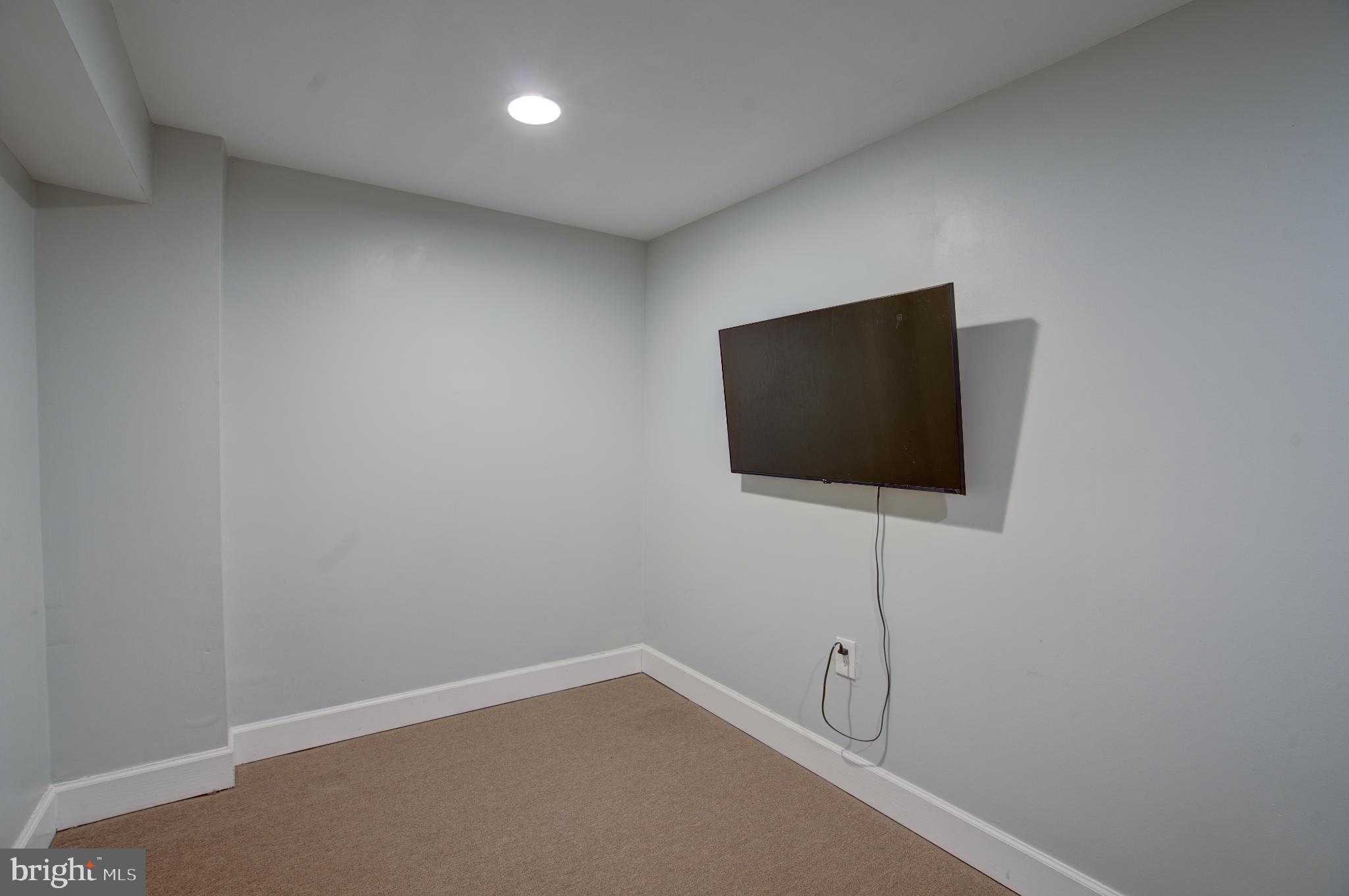 4814 Briarclift Road Baltimore, MD 21229 - Photo 29 of 34 a flat screen tv