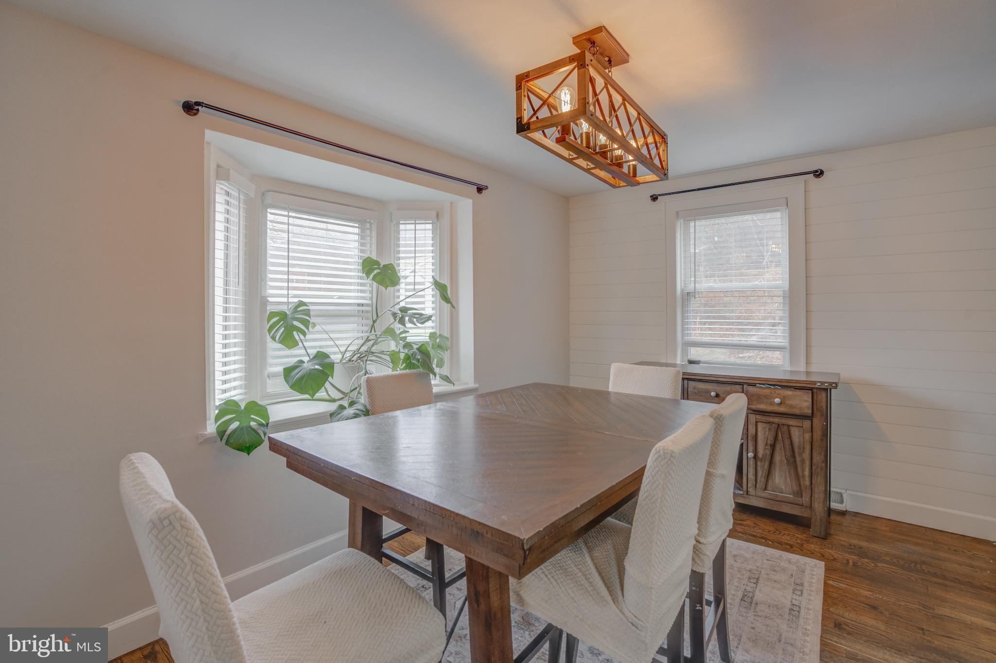 4814 Briarclift Road Baltimore, MD 21229 - Photo 7 of 34 a view of a dining table and chairs in a room