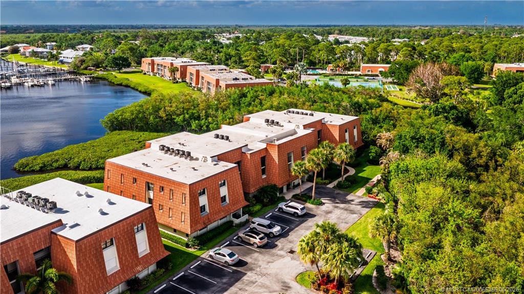 3100 Southeast Pruitt Road, Unit F101 Port St. Lucie, FL 34952 - Photo 36 of 37 Assigned & guest parking & loading zone