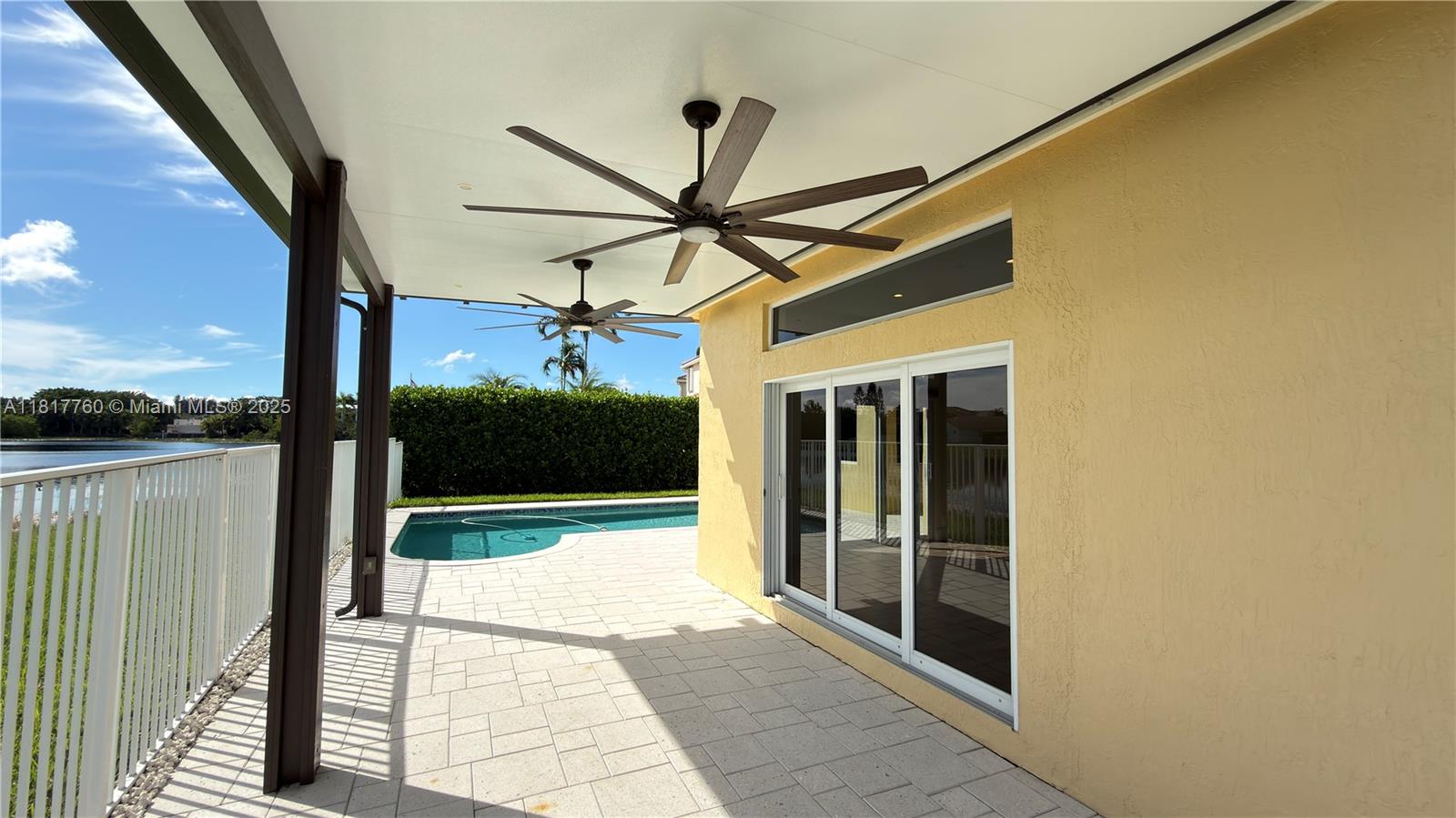 4221 Laurel Ridge Circle Weston, FL 33331 - Photo 39 of 57 a view of balcony with a floor to ceiling window and stairs