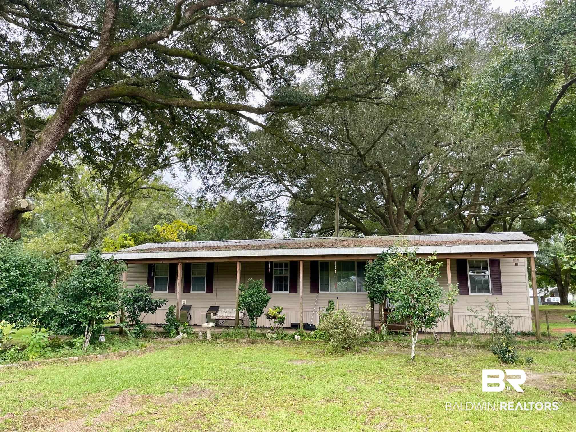 15338 Windbigler Drive Foley, AL 36535 - Photo 1 of 28 Ranch-style house featuring a front lawn
