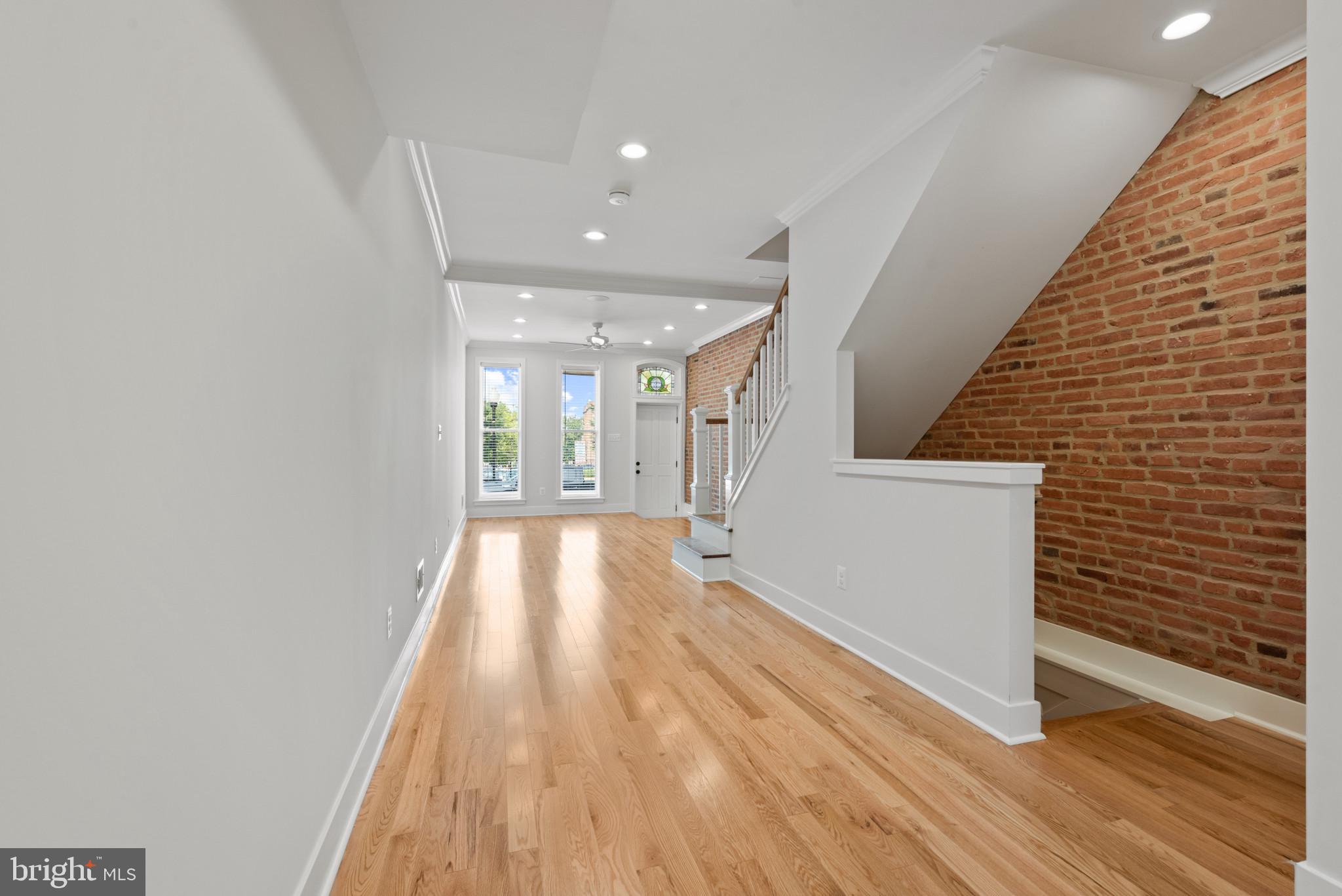 1005 Riverside Avenue Baltimore, MD 21230 - Photo 8 of 29 a view of hallway with wooden floor